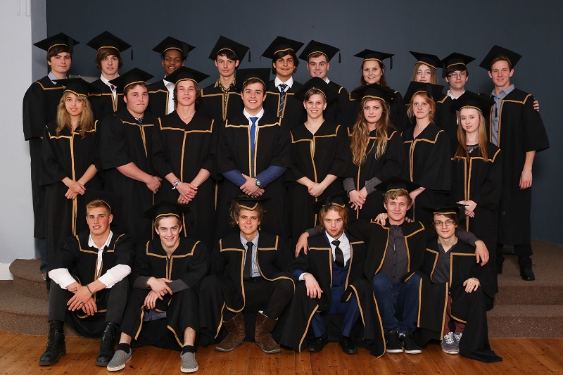 SWPS Matric and Post Matric learners in academic robes at Valedictory 2016.